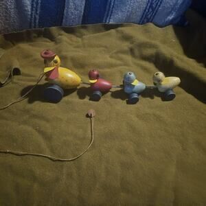 Vintage Fisher Price Wooden Duck Pull Toy has nub on end of string date 1954